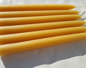 100% pure Michigan Beeswax taper Candles, choose a diameter 3/8", 1/2", 5/8", 3/4", or 7/8" tapers are 8" long Dripless. NO Zinc/Chemicals