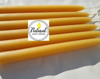 100% pure Beeswax Candle. Beeswax Tapers choose a diameter 3/8", 1/2", 5/8", 3/4", or 7/8". 8" long Dripless. Made in Michigan