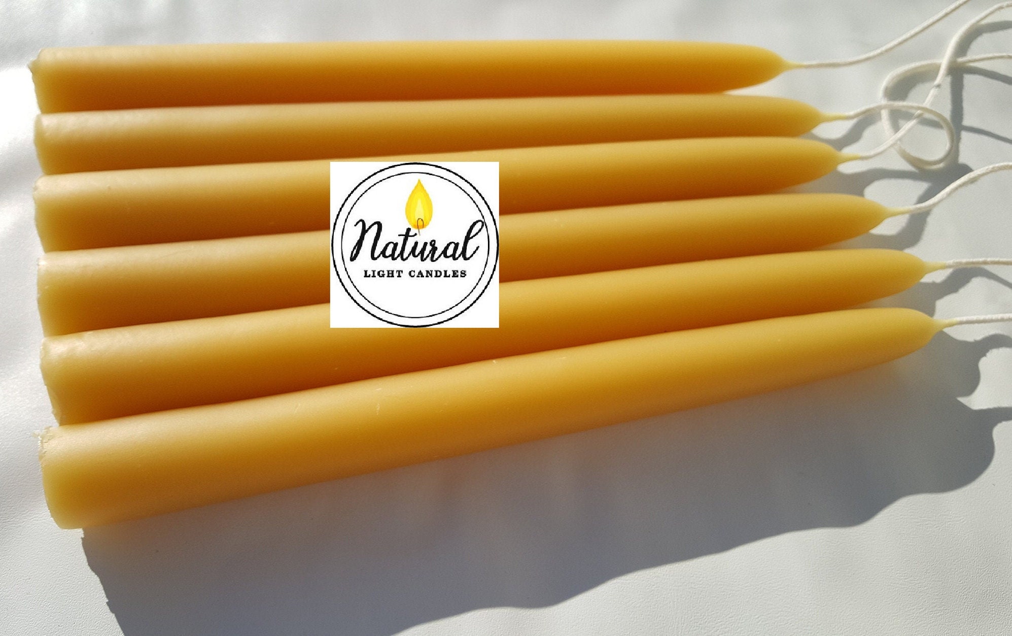 Wholesale Pair of Hand-Dipped Beeswax Taper Candles for your store - Faire