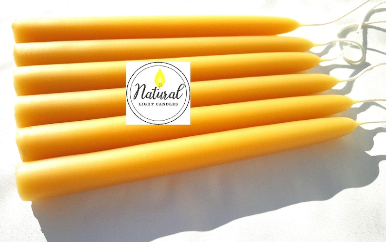 100% pure Beeswax Candle. Beeswax Tapers choose a diameter 3/8, 1/2, 5/8, 3/4, or 7/8. 8 long Dripless. Made in Michigan