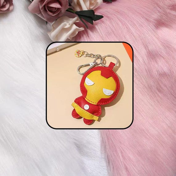 Full-grain leather, hand-stitched superhero bag charm that looks like it escaped a comic book — the craft and character design together make this genuinely one-of-a-kind.