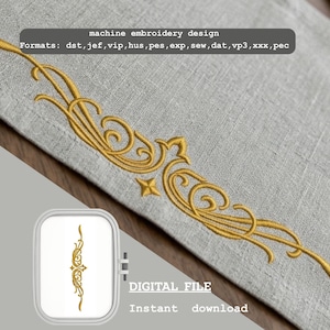 Pode incluir: Design de bordado à máquina dourado com elementos florais e geométricos. O design é exibido em tecido cinza. O texto "machine embroidery design" e "DIGITAL FILE" são visíveis.