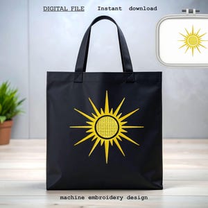 May include: Black tote bag with a yellow sunburst design. The bag has a rectangular shape with a large sun graphic in the center. The words "DIGITAL FILE" and "Instant download" are at the top. The words "machine embroidery design" are at the bottom.