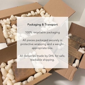 May include: Two open brown cardboard boxes filled with white foam packing peanuts and rectangular wooden blocks. The text reads: Packaging & Transport, 100% recyclable packaging, All pieces packaged securely in protective wrapping and a weight-appropriate box. All deliveries made by DHL for safe, trackable shipping.
