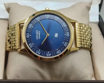 Vintage Seiko Slim Tank Stylish Quartz Men's Wrist Watch, Round case, blue Dial