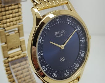 Vintage Seiko Slim Tank Stylish Men's Wrist Watch Round case Quartz movement Blue Dial