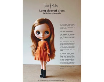 May include: A doll wearing a long-sleeved orange dress with a gathered skirt. The dress pattern is for Blythe and iMda dolls. The text on the page reads "Tirin & Katten Long sleeved dress for Blythe and iMda dolls".