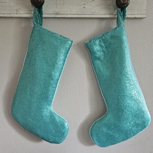 Medias navideñas turquesas con lentejuelas Medias navideñas turquesas brillantes Medias navideñas turquesas Medias turquesas