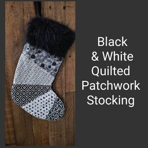 May include: Black and white quilted patchwork stocking with a black faux fur cuff.