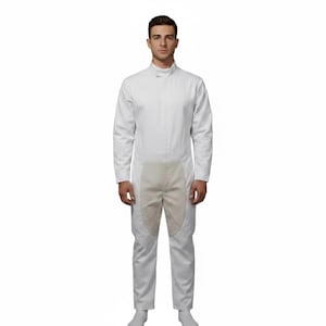 May include: A white jumpsuit with a high collar and long sleeves. The jumpsuit has beige patches on the front of the legs. The person is wearing white socks and shoes. The jumpsuit is made of a durable material.