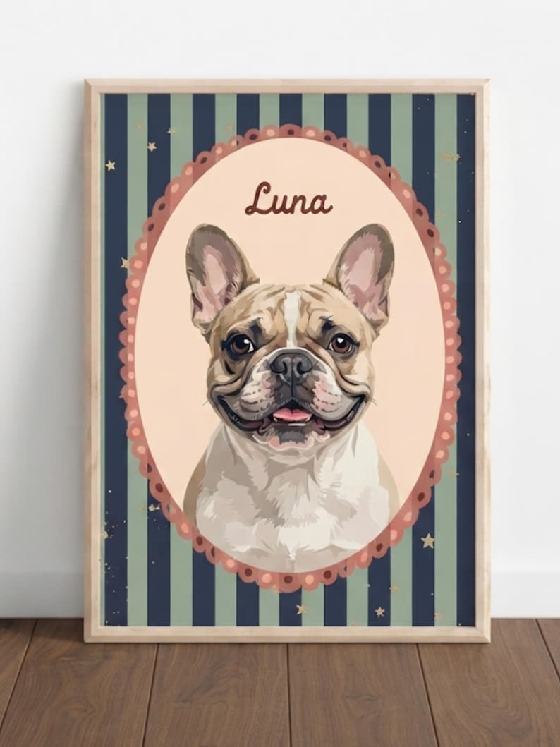May include: A framed wall art print featuring a portrait of a fawn and white French Bulldog inside a scalloped oval frame. The background has vertical dark blue and sage green stripes with small gold stars. The name Luna is printed in brown.