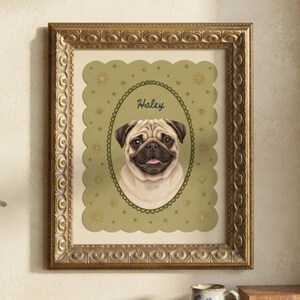 May include: A framed wall art print featuring a tan pug portrait centered within an oval frame on a sage green background with small sun and star icons. The name Haley is written in cursive above the dog. The frame is ornate, metallic gold.