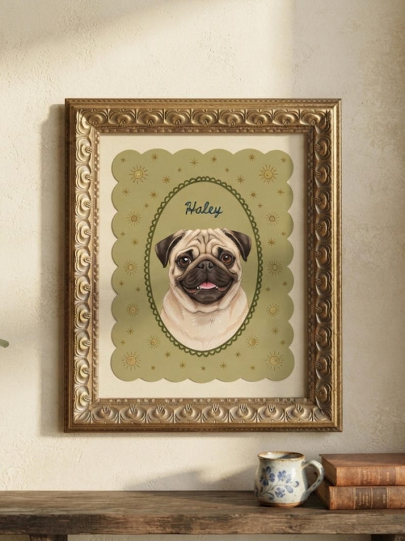 May include: A framed wall art print featuring a tan pug portrait centered within an oval frame on a sage green background with small sun and star icons. The name Haley is written in cursive above the dog. The frame is ornate, metallic gold.