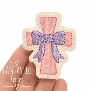 May include: A set of three ceramic mugs with a speckled, matte finish. The mugs are in shades of cream, light gray, and dark gray. Each mug has a simple, minimalist design, perfect for coffee or tea.