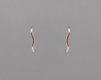Modern ear huggers, wrap around earrings, handmade, silver or gold | Course Suspender Earring from the Springs Collection by Haley Lebeuf