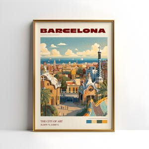 May include: A framed art print featuring a colorful illustration of Barcelona. The print includes the word "BARCELONA" in a bold font at the top and "THE CITY OF ART" at the bottom, with coordinates. The artwork depicts buildings, the sea, and sky.