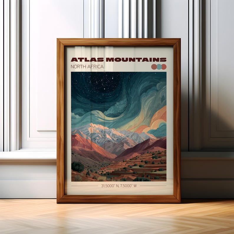 May include: A framed print featuring a landscape of the Atlas Mountains in North Africa. The artwork showcases a colorful depiction of the mountains under a starry night sky. The print includes the text "ATLAS MOUNTAINS NORTH AFRICA" and coordinates.