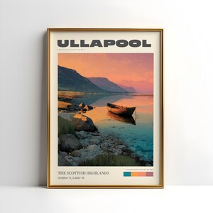 May include: A framed print featuring a serene landscape of Ullapool, Scotland. The image showcases a boat on calm water, with mountains in the background under a colorful sunset. Text at the top reads "ULLAPOOL" and at the bottom "THE SCOTTISH HIGHLANDS".