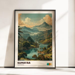 May include: A framed art print showcasing a landscape of Sumatra, Indonesia. The image presents a river flowing through green hills and mountains beneath a cloudy sky. The print includes the text "SUMATRA INDONESIA" at the bottom.