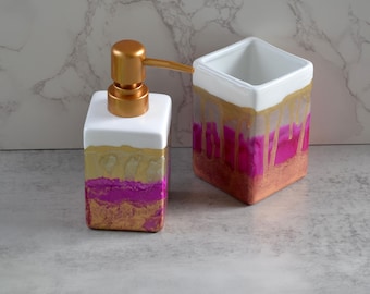 Hand painted bath vanity set in gold and magenta.
