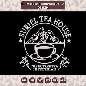 May include: A white machine embroidery design on a black background featuring a circular emblem with a teacup, steam, and mountain peaks. The text reads SURIEL TEA HOUSE and THE HOTTESTTEA IN PRYTHIAN, accented by two stars and leaf sprigs.