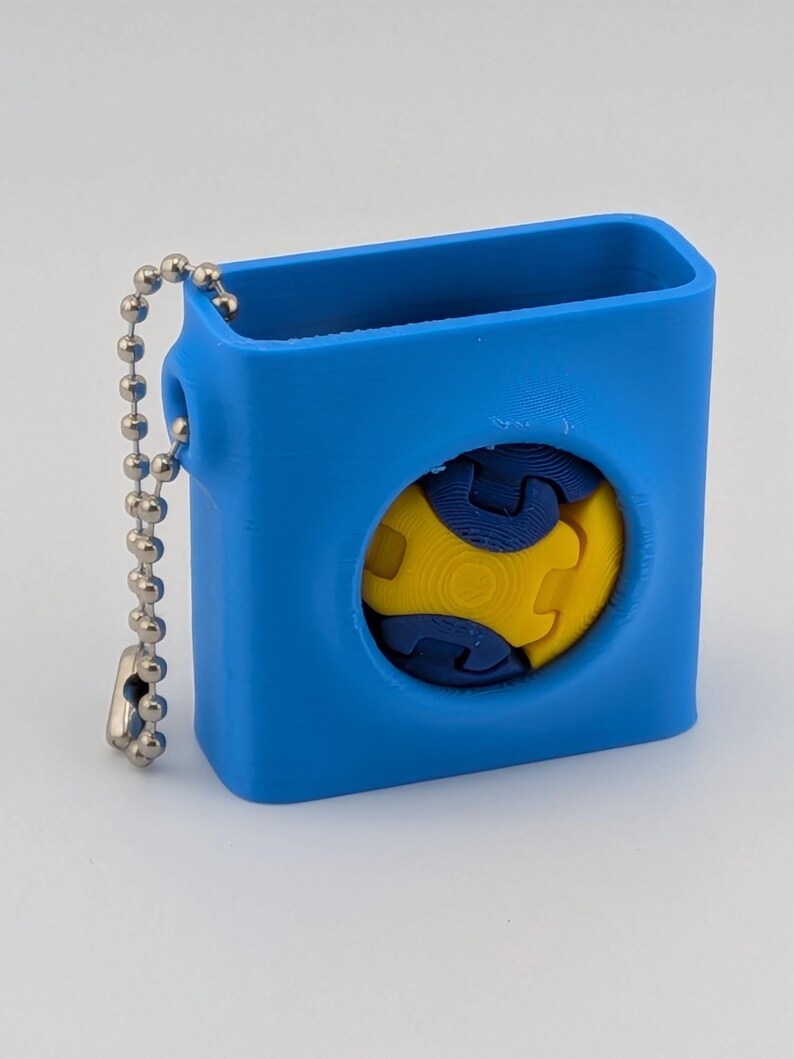 Kinetic Zorble Pop Out Fidget Sphere - Articulated Spinning Keychain ...