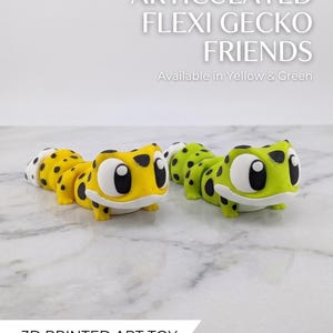 May include: Two articulated gecko toys, one yellow with black spots and the other green with black spots, are displayed. The toys have large white eyes and are labeled "ARTICULATED FLEXI GECKO FRIENDS" and "3D PRINTED ART TOY".
