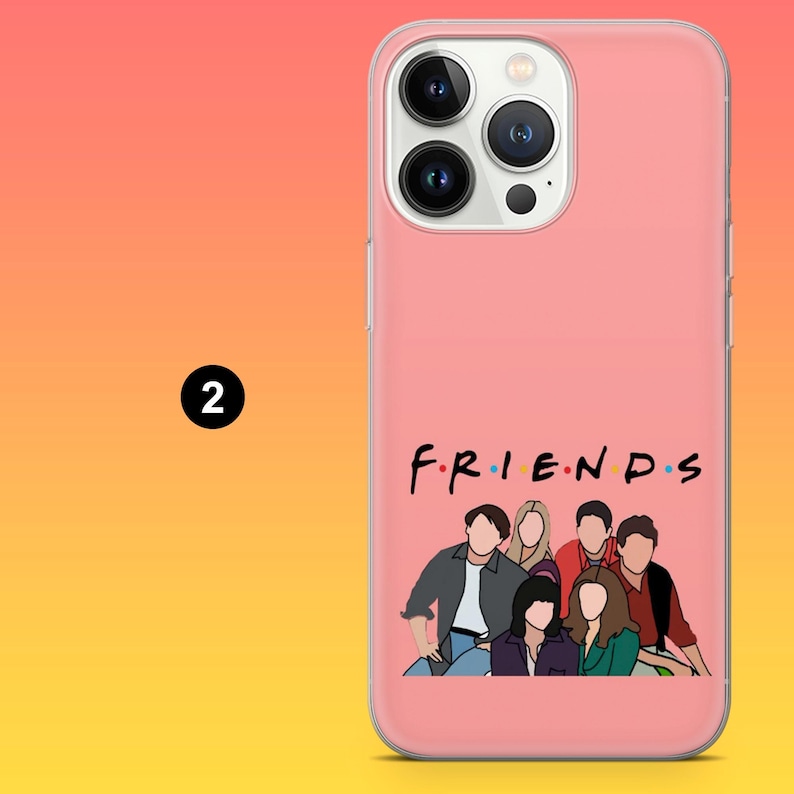 May include: Pink phone case featuring the word "FRIENDS" in a colorful font, with an illustration of the six main characters. The case is designed for a smartphone and has a clear border.