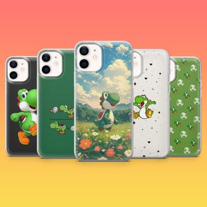 May include: A collection of five phone cases featuring the character Yoshi from the Super Mario franchise. The cases display various designs, including Yoshi in a field, a running Yoshi, and patterns of Yoshi and eggs. The cases have a clear, protective design.