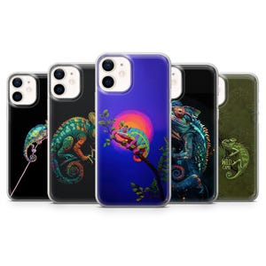 May include: A selection of phone cases displaying chameleon artwork. The cases feature diverse artistic depictions of chameleons, with vivid colours and intricate illustrations. The backgrounds vary, including a sunset and a dark green camouflage pattern.