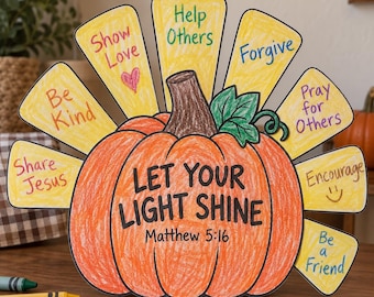 May include: A paper craft pumpkin with a brown stem and green leaf, featuring the text "LET YOUR LIGHT SHINE Matthew 5:16". Yellow paper feathers extend from the back, each with handwritten phrases like "Be Kind," "Show Love," and "Help Others."