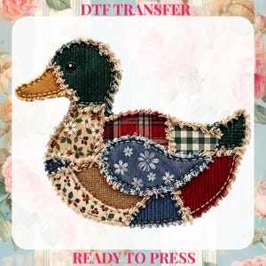 May include: A DTF TRANSFER READY TO PRESS graphic featuring a patchwork duck design. The duck is composed of various fabric patterns including dark green corduroy, red plaid, green gingham, blue denim with white flowers, and floral prints with frayed edges.