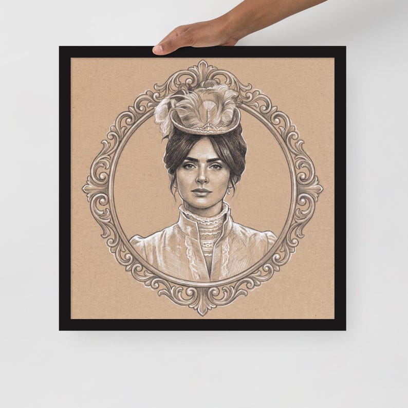 May include: A framed pencil sketch of a woman in a vintage hat and dress, set within an ornate oval frame. The artwork is in shades of brown and beige, with the woman's portrait as the focal point. The frame is black.