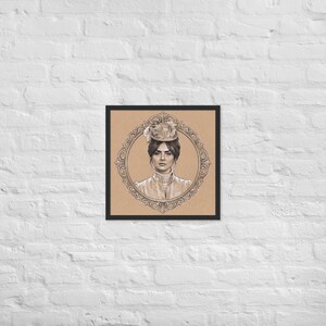 May include: Framed portrait of a woman in a vintage hat and attire. The sepia-toned artwork is set within an ornate oval frame, encased in a black frame. The portrait is set against a tan background.