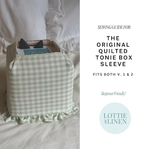 May include: A quilted Tonie Box sleeve in a light green and white gingham pattern, trimmed with lace and a ruffled edge. The text on the image reads "The Original Quilted Tonie Box Sleeve" and "Beginner Friendly!"