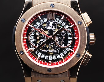 Refurbished Quartz Hublot Geneve In Black&Red Dial Men's Watch With Date Indicator.