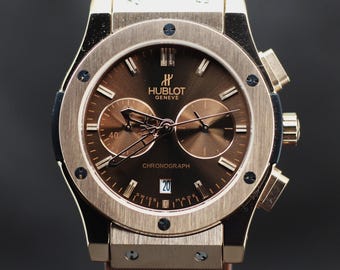 Odnowiony męski zegarek Hublot Geneve z mechanizmem kwarcowym i wskaźnikiem daty.