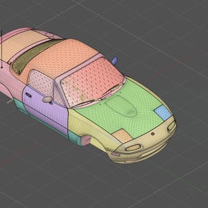 Pode incluir: Um modelo 3D de um carro pequeno e colorido, renderizado com um efeito de estrutura de arame. A carroceria do carro é dividida em seções de várias cores, incluindo rosa, verde, roxo e azul. O modelo inclui detalhes como faróis, espelhos e para-brisa.