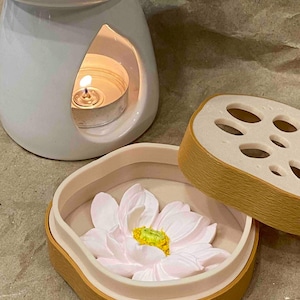 May include: A trio of ceramic mugs with a speckled, matte finish in cream, light grey, and dark grey. The mugs have a simple, minimalist design, suitable for coffee or tea.