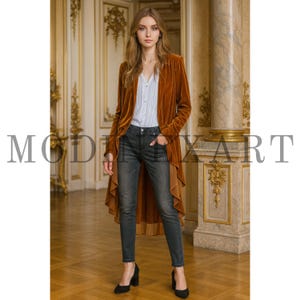 May include: A long-sleeved, burnt orange velvet duster jacket with a high-low hemline, worn over a white button-down shirt and dark gray denim jeans. The outfit is completed with black high-heeled pumps.
