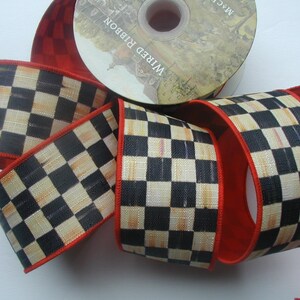 May include: Black and white checkered ribbon with a red edge. The ribbon is wired and has a distressed look.