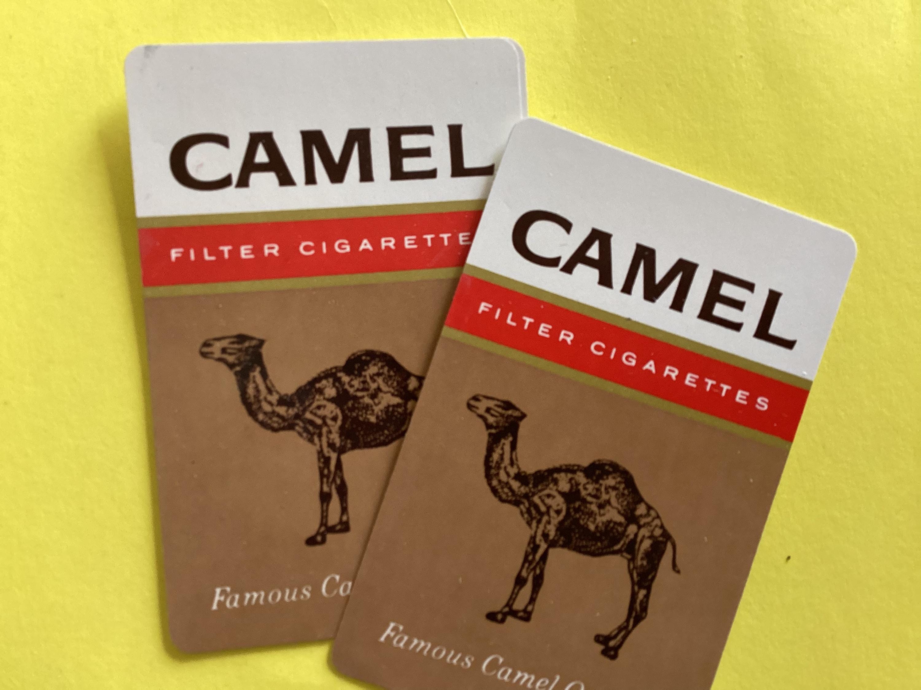 cigarette chocolate candy I got found these chocolate cigarettes at a candy shop, and the paper  around the chocolate doesn't seem to be edible. It also doesn't come off  easily. How did people eat these? :
