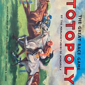 May include: Vintage Totopoly board game box featuring a horse race scene with jockeys in colorful attire. The box has a blue background with the game title in red. Manufactured by John Waddington Ltd.
