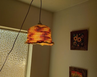 Handcrafted crochet swag pendant light