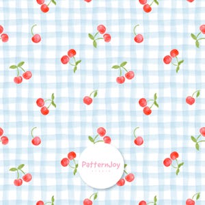 May include: A repeating pattern featuring watercolour red cherries with green stems and leaves set against a light blue and white checkered background. A circular white logo with the pink text PatternJoy Studio is centred at the bottom.