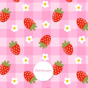 May include: A repeating pattern featuring red strawberries with green stems and white flowers on a pink gingham backdrop. The strawberries have white seeds. The design is a cheerful and playful pattern.