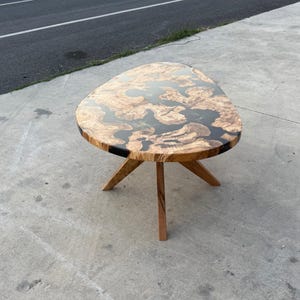 Modern epoxy resin coffee table in living room — minimalist handmade decor