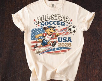 USA 2026 All-Star Soccer Mascot Graphic Tee – Comfort Colors Patriotic Shirt