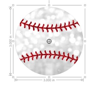 May include: A circular baseball graphic featuring a white background with a soft, bokeh-style light effect and two curved rows of red stitching. The design is framed by measurement lines indicating a diameter of 3.000 inches for the circular object.