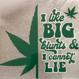 May include: Green vinyl decal with the text "I like BIG blunts & I cannot LIE" and a large green marijuana leaf.